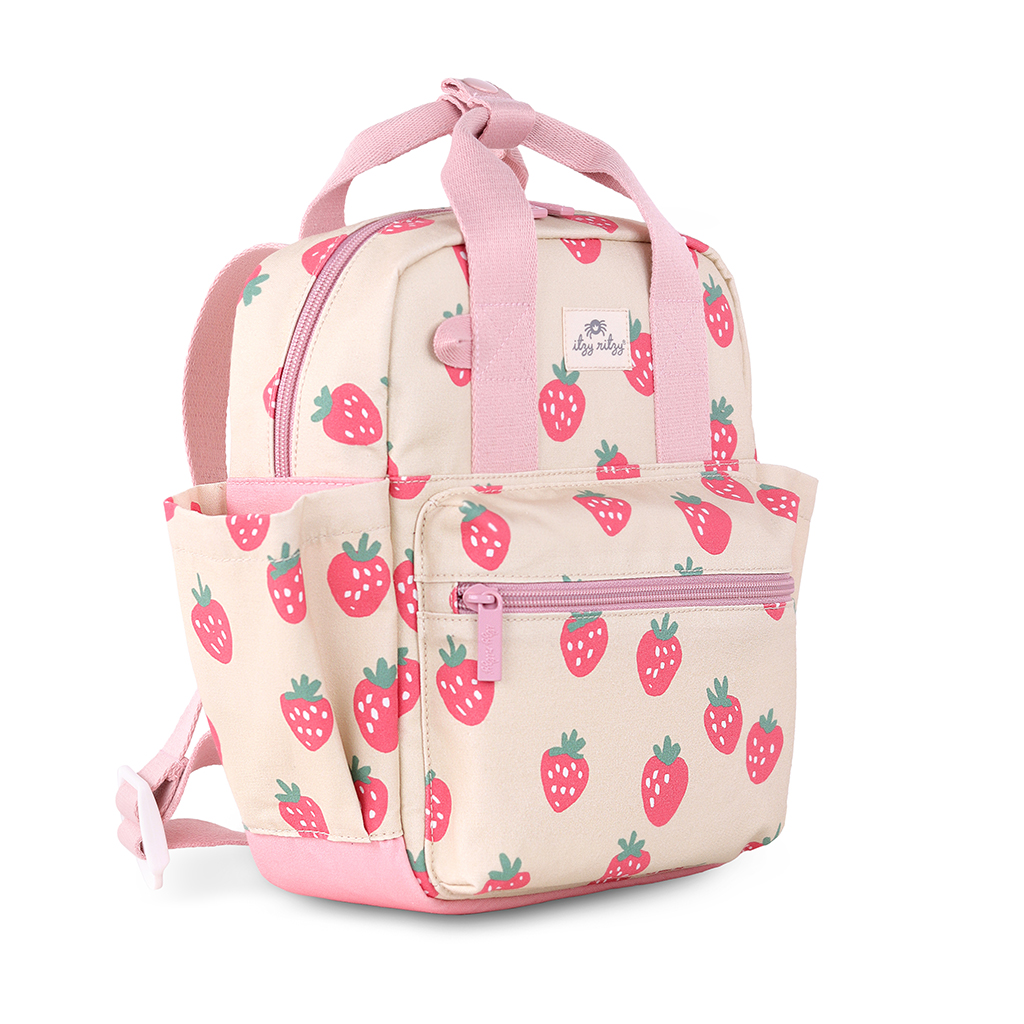 101601543 Itzy Bitzy Bag™ Toddler Backpack - Strawberries & Cream (4) The Itzy Ritzy Sweetie Strap Plus Bear Silicone Pacifier Clip comes in a charming beige and pink design with an adorable strawberry print. It includes two front zippered pockets, convenient side pockets, and easy-to-grip top handles.