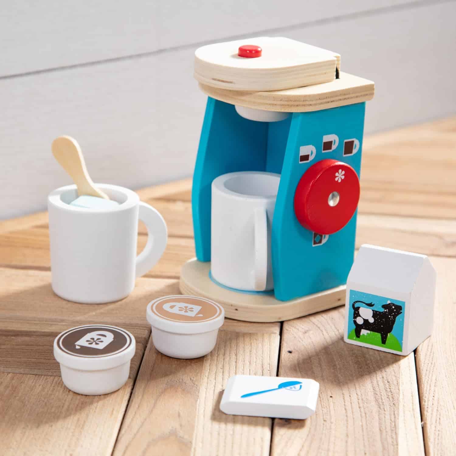 Melissa & Doug Brew & Serve Wooden Coffee Maker Set (Play Kitchen Accessories, Encourages Imaginative Play, A Melissa & Doug Brew and Serve Wooden Coffee Maker Set with cups and mugs on a wooden table.