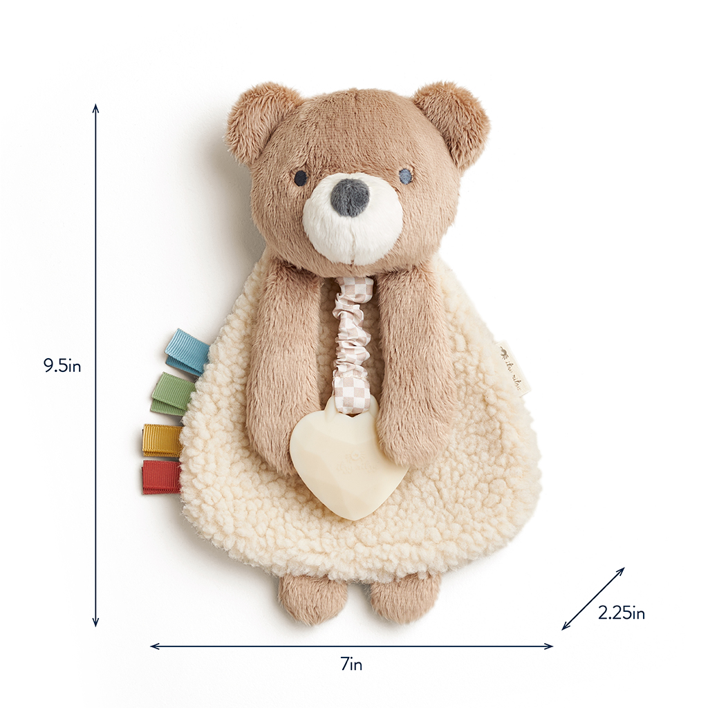302801667_Itzy_Ritzy_Itzy_Lovey_Bear A plush bear toy with a cream-colored belly, multicolor ribbon tags on its left, and an attached beige teether at the front. Dimensions are 9.5 inches tall, 7 inches wide, and 2.25 inches deep.