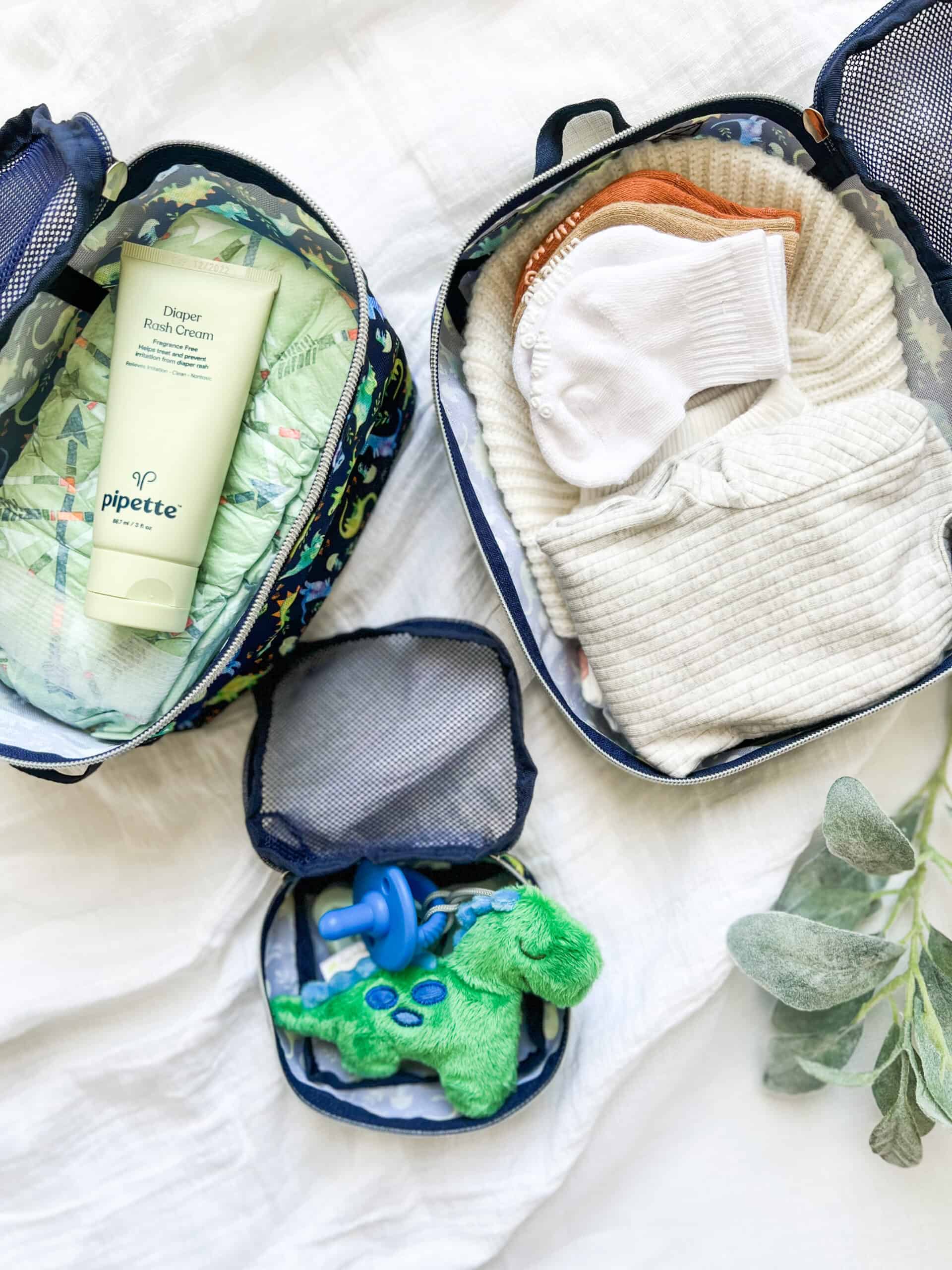 Itzy-Ritzy-Travel-Organizer-PC8085-Raining-Dinos-Blue-Dino-1-scaled