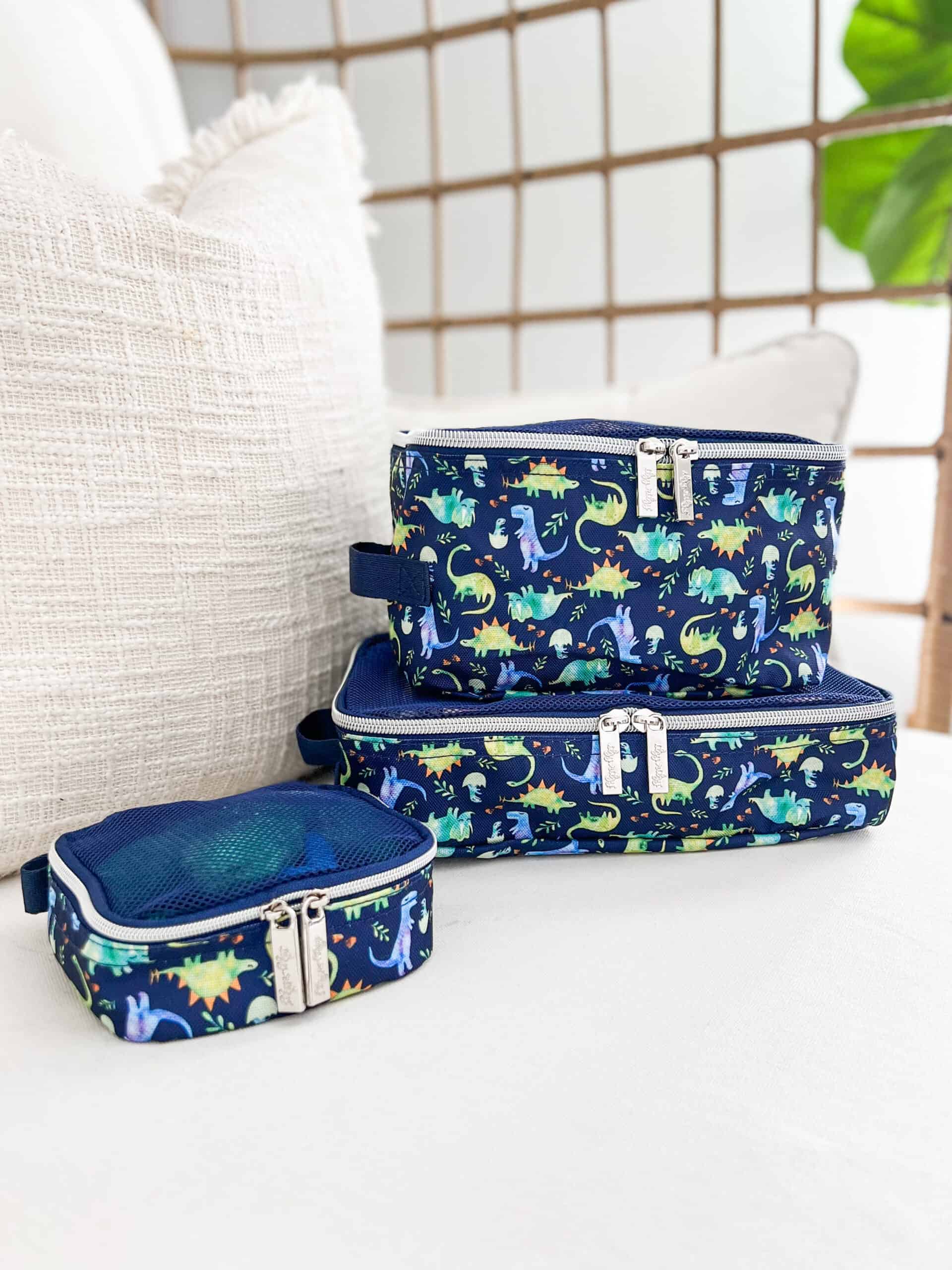 Itzy-Ritzy-Travel-Organizer-PC8085-Raining-Dinos-Blue-Dino-scaled