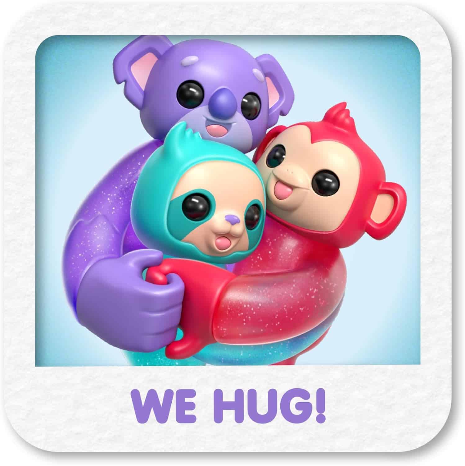 Little Live Pets Hug n' Hang Zoogooz - Koomi Koala. an Interactive Electronic Squishy Stretchy Toy Pet with 70+ Sounds & Reactions. Stretch, Squish and Link Their Hands (5) A purple koala, a red monkey, and a blue creature are hugging each other with the caption "WE HUG!" below them.