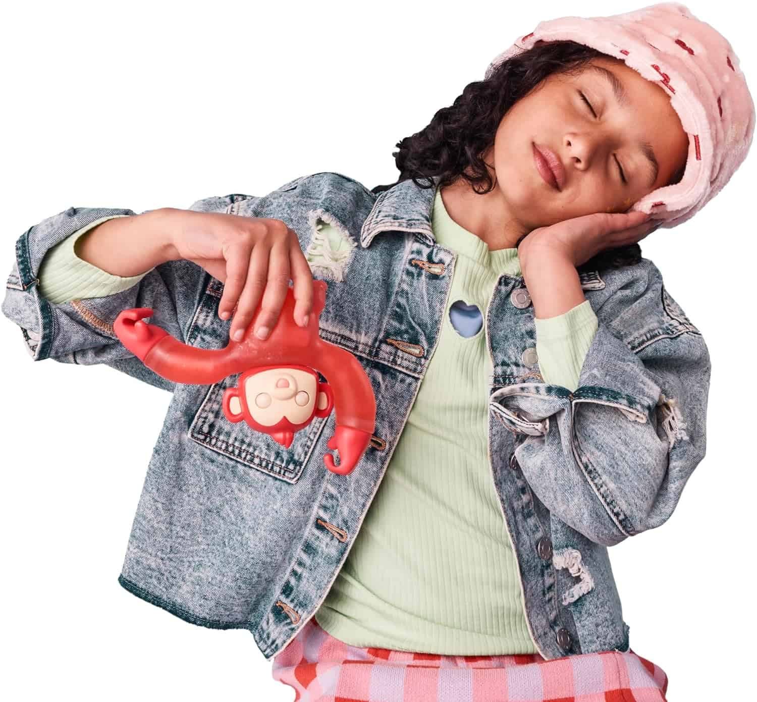 Little Live Pets Hug n' Hang Zoogooz - Mookie Monkey. an Interactive Electronic Squishy Stretchy Toy Pet with 70+ Sounds & Reactions. Stretch, Squish & Link Their Hands Medium (3) A young girl wearing a bucket hat and denim jacket holds a red toy monkey while resting her head on her hand.
