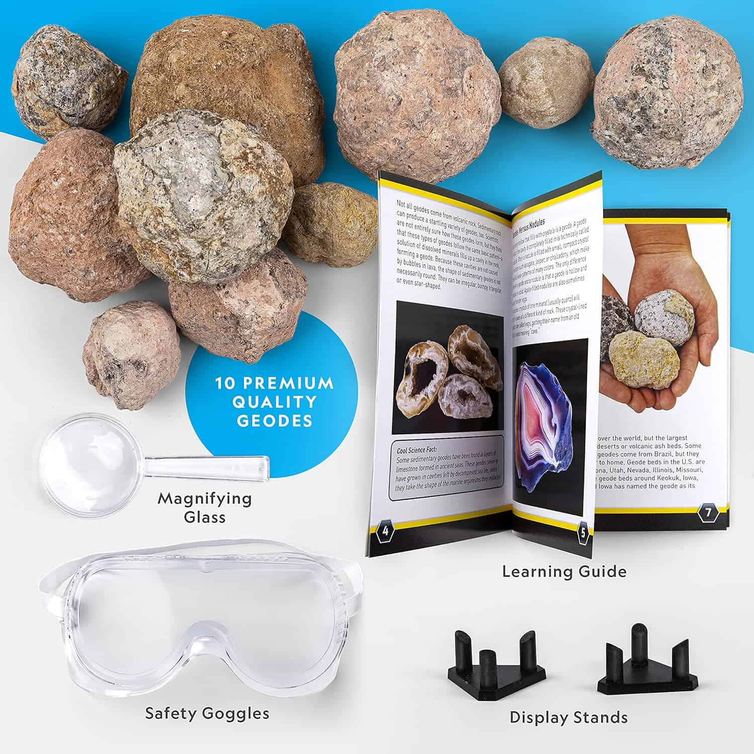 NATIONAL GEOGRAPHIC Break Open 10 Premium Geodes (2) A National Geographic Break Open 10 Premium Geodes kit containing a learning guide, a magnifying glass, safety goggles, and two display stands. The geodes are shown alongside the educational materials on a white and blue background.
