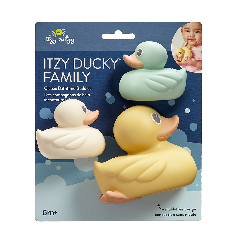 RD8553_Itzy_Ritzy_Bath_Itzy_Ducky_Family Packaging for "Itzy Ritzy Ducky Family Floating Bath Toys," featuring three rubber duck bath toys in yellow, blue, and white. The packaging is labeled for ages 6 months and up and is depicted with a baby holding a duck toy.