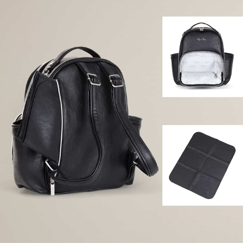itzy-ritzy-101401619-itzy-mini-plus-backpack-noir-13 Black leather backpack with a silver zipper, shown alongside a black and grey patterned front pocket detachable bag and a square black leather mat.