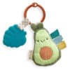 A plush Itzy Ritzy - Itzy Pal toy with a textured blue leaf teether and colorful ribbon tags, attached to a ring.
