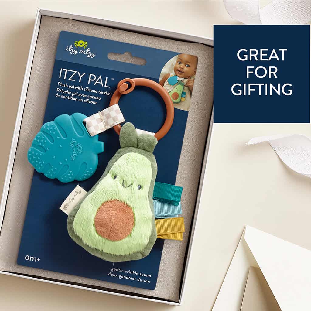 231220_Itzy_Ritzy_Digital_Shelf_ItzyPalAvocado A Itzy Ritzy - Itzy Pal - Plush Pal Infant Toy with Silicone Teether in a gift box with a label that reads "itzy pal," featuring a plush avocado and accessories. text on the image says "great for gifting.