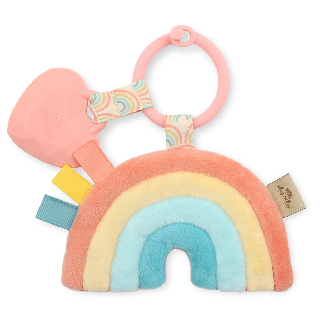 itzy-ritzy-tpl3003-itzy-pal-rainbow-5 Colorful baby teething toy designed as an Itzy Ritzy - Itzy Pal - Plush Pal Infant Toy with attached silicone teether and fabric tags, isolated on a white background.