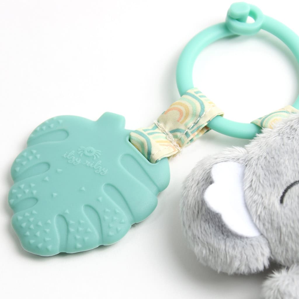 itzy-ritzy-tpl8443-itzy-pal-koala-3 Teething toy shaped like a leaf attached to an Itzy Ritzy - Itzy Pal - Plush Pal Infant Toy with Silicone Teether on a white background.